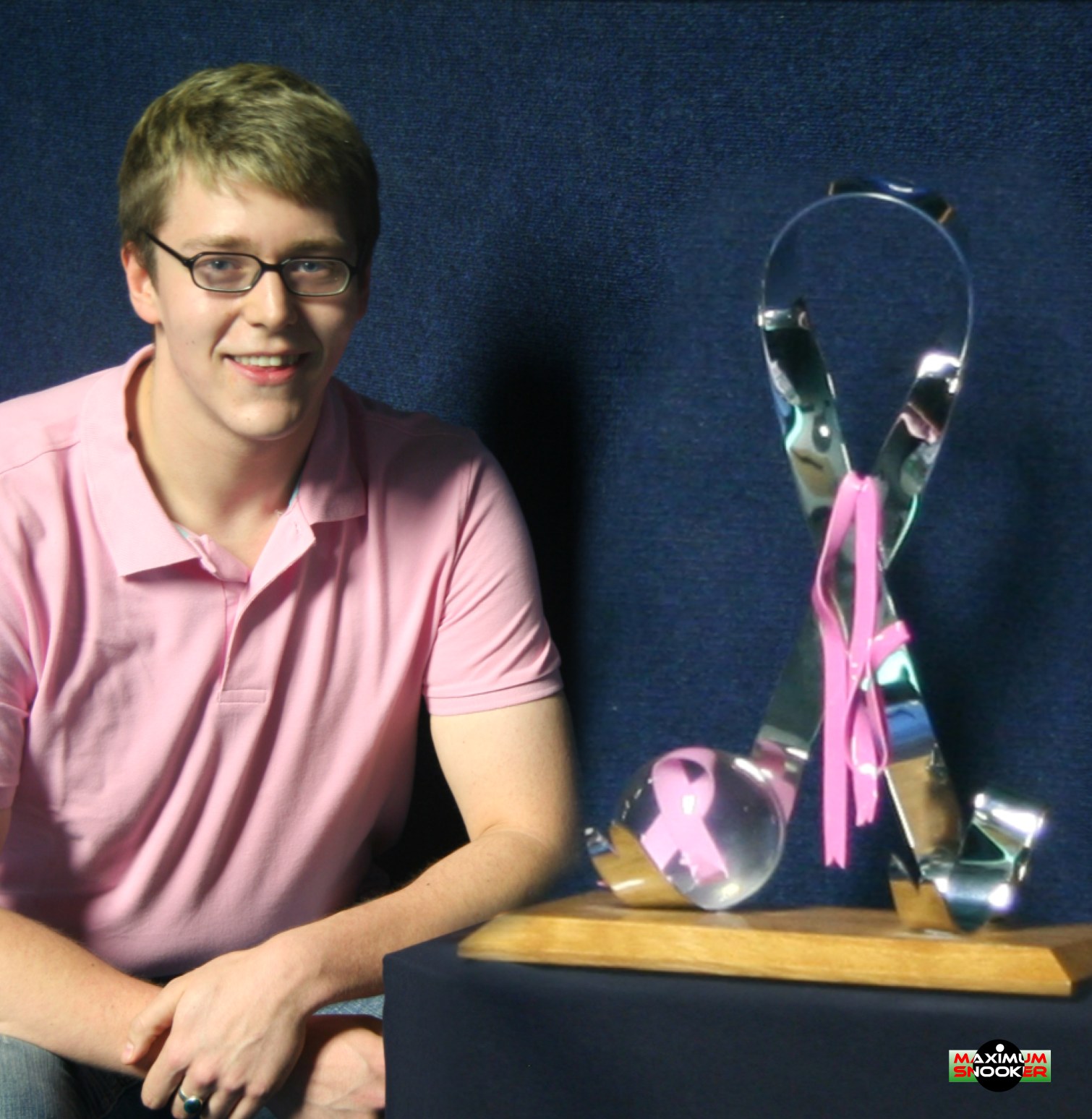 Stephen Kent plus pink ribbon trophy